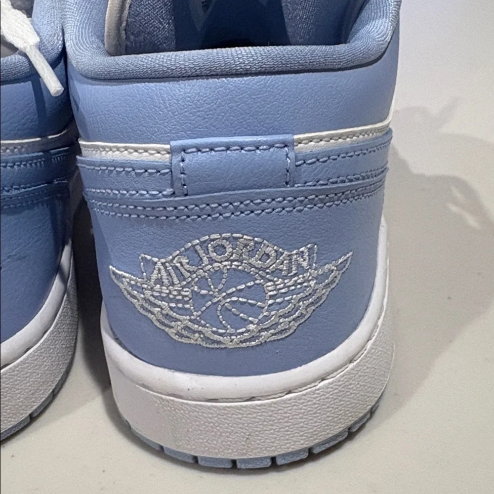 Nike - Women's Air Jordan Retro 1 Low Sneakers. White and baby blue.